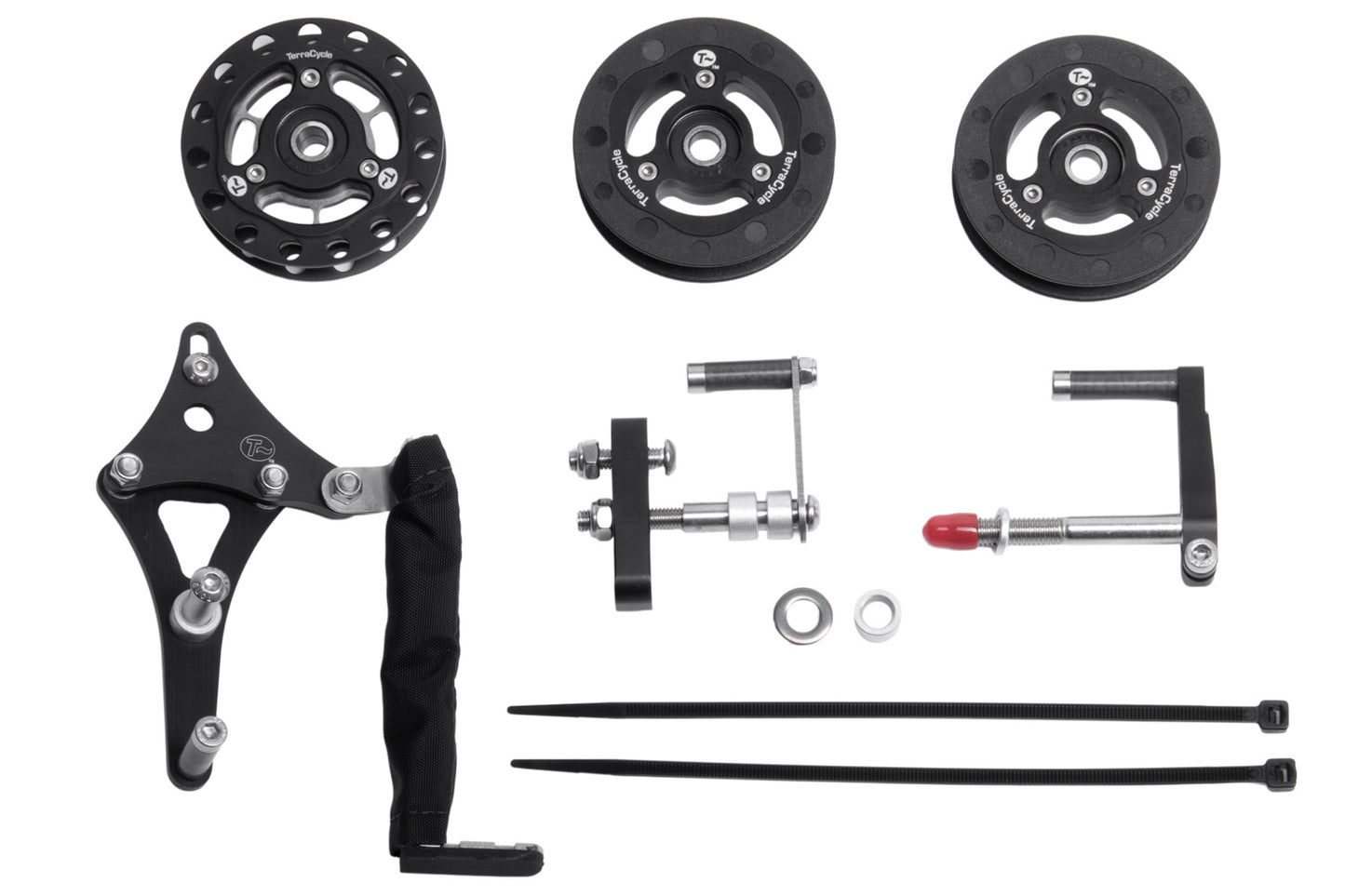 Kettenleitrollen Set für Optima Baron ELITE gross. Bestehend aus 1x Antriebsrolle mit Titanritzel und keramischem Kugellager,
2x Rücklaufrolle mit keramischem Kugellager und der speziellen Montagehalterung. Aufsicht komplett von oben.