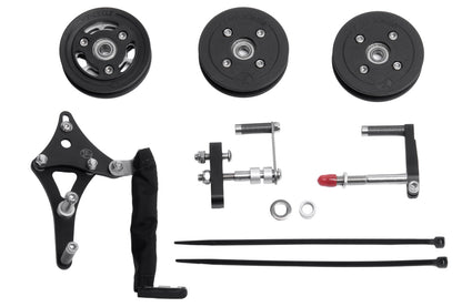 Kettenleitrollen Set für Optima Baron SPORT gross. Bestehend aus 1x Antriebsrolle mit Titanritzel und keramischem Kugellager,
2x Rücklaufrolle mit keramischem Kugellager und der speziellen Montagehalterung. Aufsicht komplett von oben.